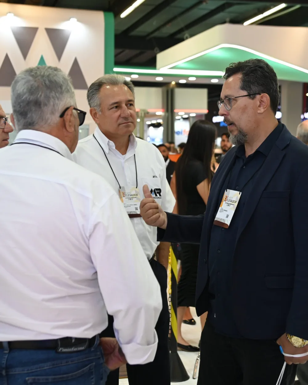Professionals at a traction-machine booth